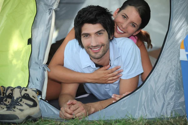 Portrait of a couple in a tent — Stock Photo, Image