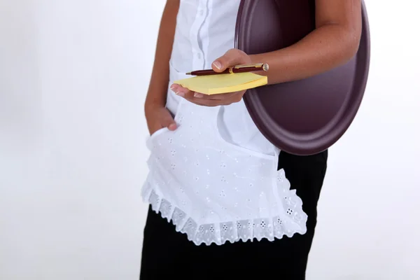 Waitress holding note pad and pen — Stock Photo, Image