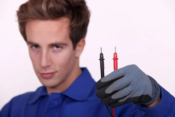 Electrician holding Electrodes — Stock Photo, Image