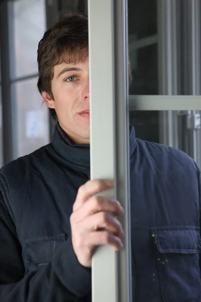 Carpenter with face half hidden — Stock Photo, Image