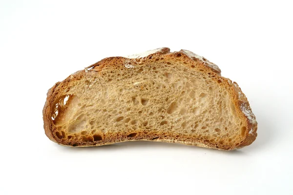 Rebanada de pan rústico — Foto de Stock