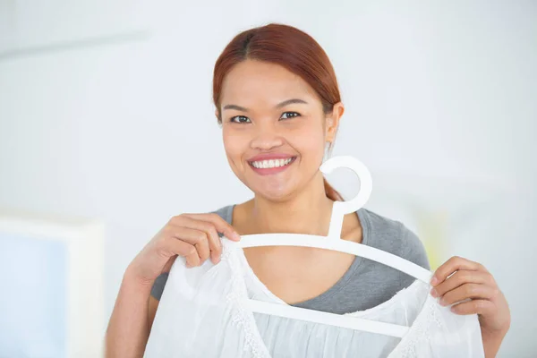 Happy Woman Trying Shirt — Stock Photo, Image