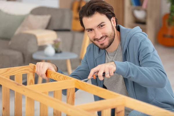 Man Putting Together Self Assembly Furniture New Home — Stock Photo, Image