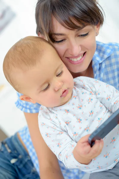 Modern Baby Plays Phone — Stock Photo, Image