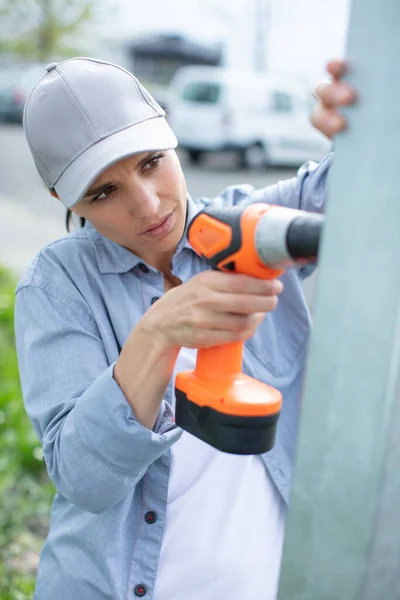 Young Woman Drilling Wall Electric Drill — Stock Photo, Image