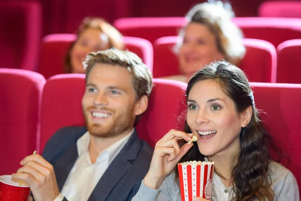 Happy Couple Eating Popcorn While Watching Film Cinema — 图库照片