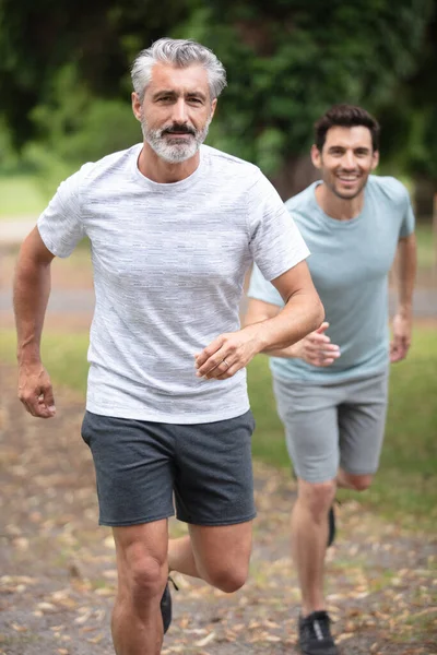 Old Dad Son Running Countryside Together — 图库照片