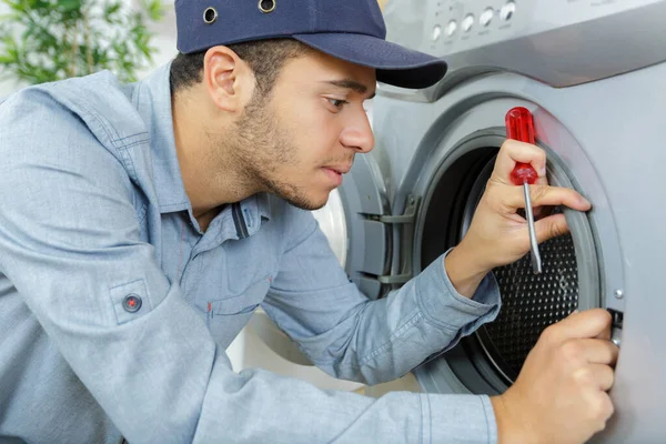 Young Man Holding Screw Wrench Screw Machine — Stockfoto