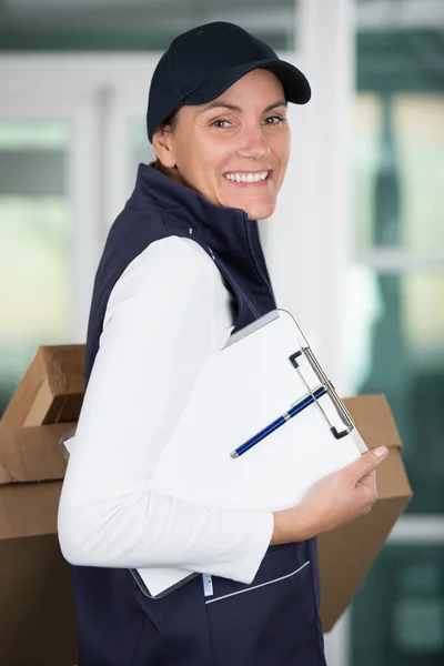 Delivery Woman Uniform Holding Package — Stock Photo, Image
