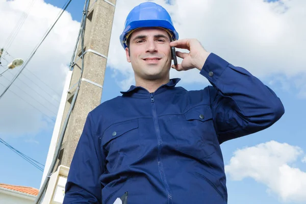 Low Angle View Electrician Using Telephone — Foto Stock