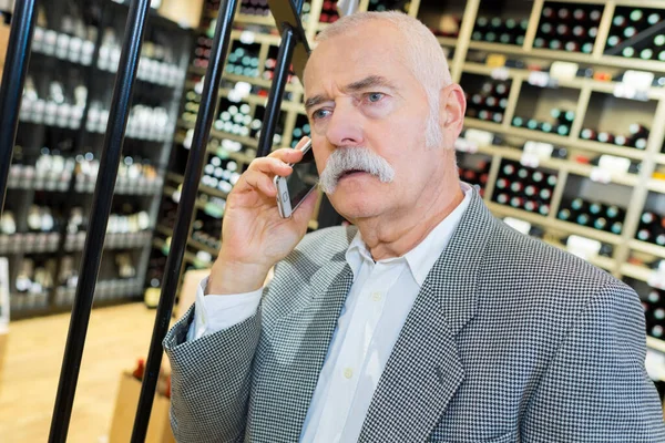 Man Calling Choose Right Wine — Stockfoto