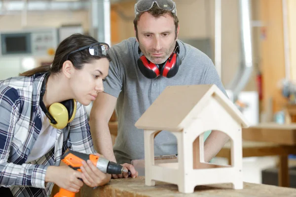 Man Woman Looking House Model Drill — Zdjęcie stockowe