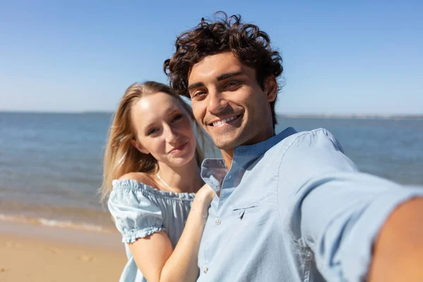 Pretty Young Loving Couple Taking Selfie Together Smartphone — стоковое фото