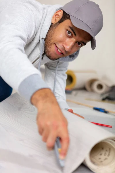 Young Man Doing Repairs Apartment Wallpapering Wall — Stock Photo, Image