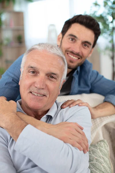 Adult Son Father Sitting Sofa — Stock Photo, Image