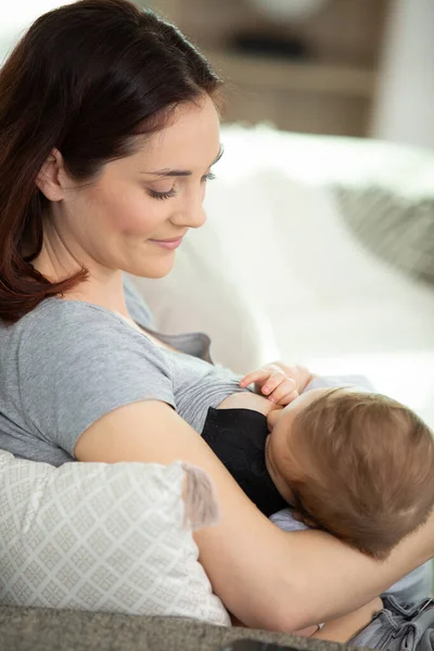 Peaceful Woman Breastfeeding Home — Stock Photo, Image