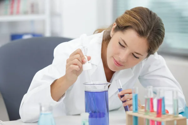 Happy Woman Chemist Making Mixture — Stock Photo, Image