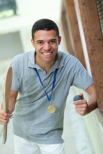 Happy Sportsman Holding Gold Medals Pointing — Stock Photo, Image