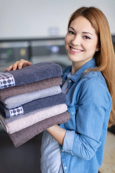 Happy Woman Holding Towels — Stock Photo, Image