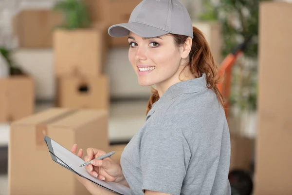 Delivery Woman Uniform Holding Package — Stock Photo, Image