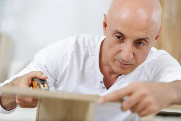 Carpenter Takes Measures Furniture — Stock Photo, Image