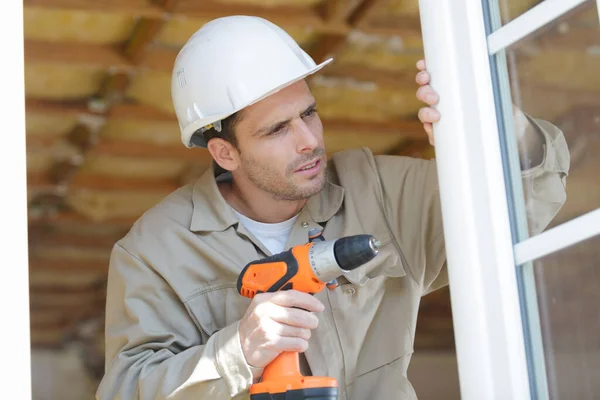 Man Drilling Window Frame — Stock Photo, Image