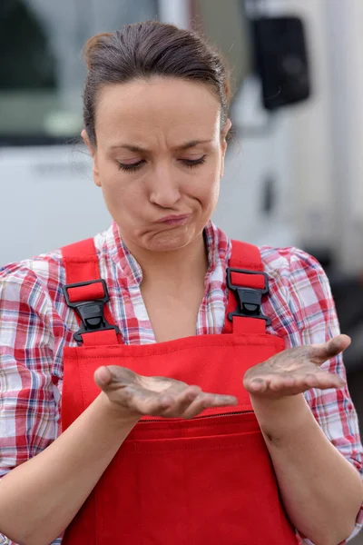 Female Manual Worker Looking Woefully Her Dirty Hands — Stock Photo, Image