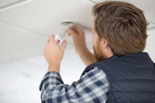 Male Electrician Fixing Light Ceiling — Stock Photo, Image