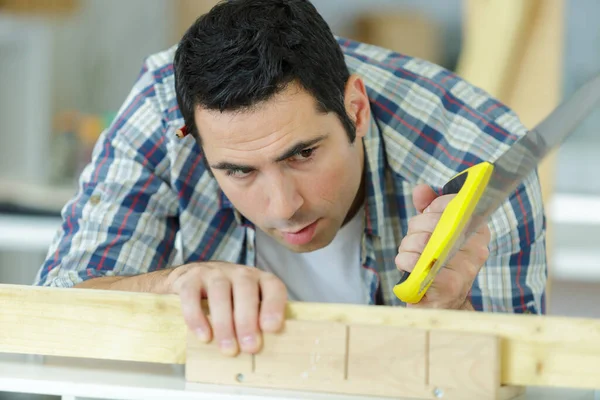 Man Sawing Cutting Wood Board — Stock Photo, Image