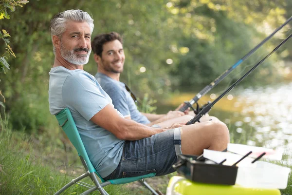 Two Men Enjoying Day Out Fishing — ストック写真
