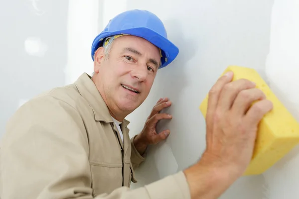 Mature Plasterer Finishing Wall Sponge Float — Stock Photo, Image