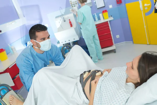 Man Inspecting Dilation — Stock Photo, Image