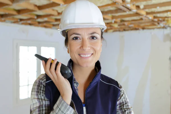 Happy Woman Builder Protective Clothes Construction Site Walkie Talkie — стоковое фото