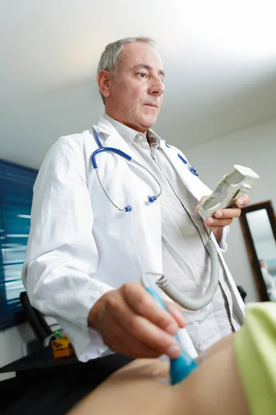 Doctor Holding Ultrasound Transducer —  Fotos de Stock