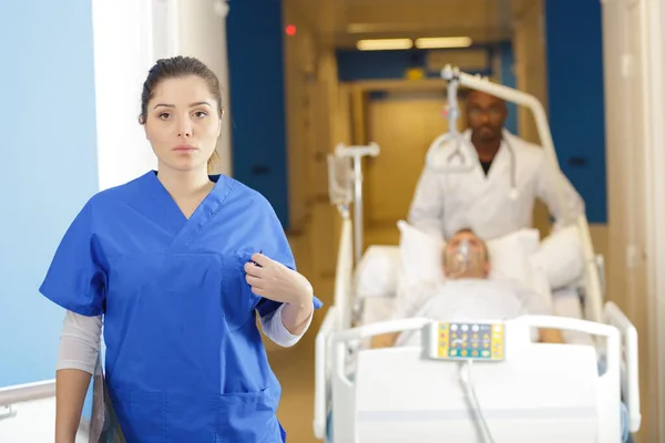 Nurse Talking Care Man Being Transferred — ストック写真