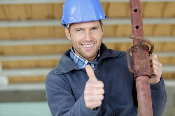 Worker Water Pipe Showing Thumb — Stockfoto