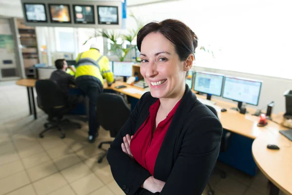 Cheerful Businesswoman Standing Arms Folded Office — Stockfoto