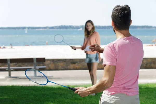 Couple Playing Badminton Seaside — 스톡 사진