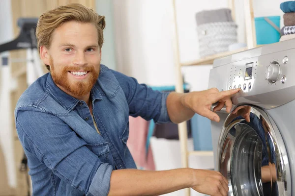 Happy Young Husband Man Doing Laundry Home — Stock Photo, Image