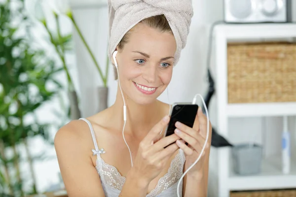 Portrait Woman Bathrobe Towel Using Headphones — Stok fotoğraf