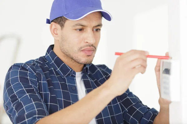 Installing Programmable Room Thermostat — Stock Photo, Image