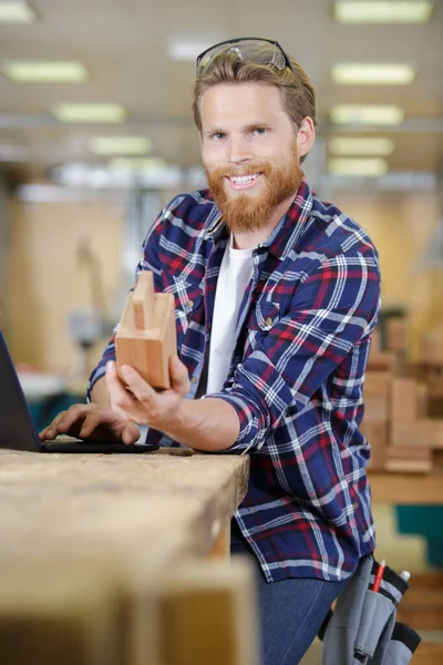 Happy Man Holds Piece Wood — стоковое фото