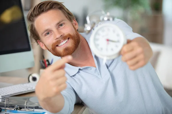 Young Male Contractor Repairing Alarm Clock Workshop — 图库照片