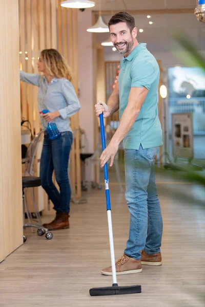 Young Couple Having Fun While Doing Cleaning Home — Stok fotoğraf