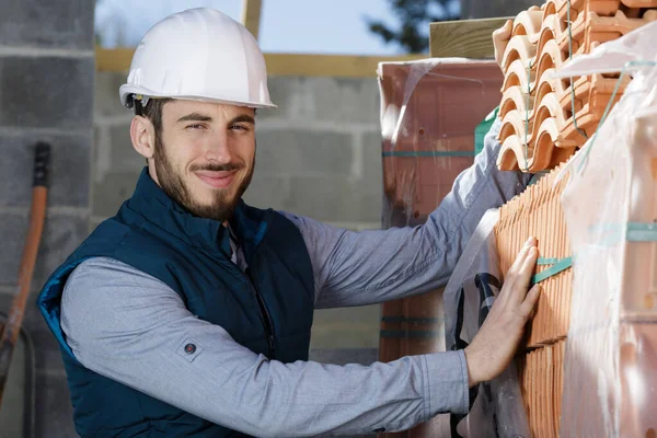 Young Bricklayer Red Brick Stack Building Construction — Stok fotoğraf