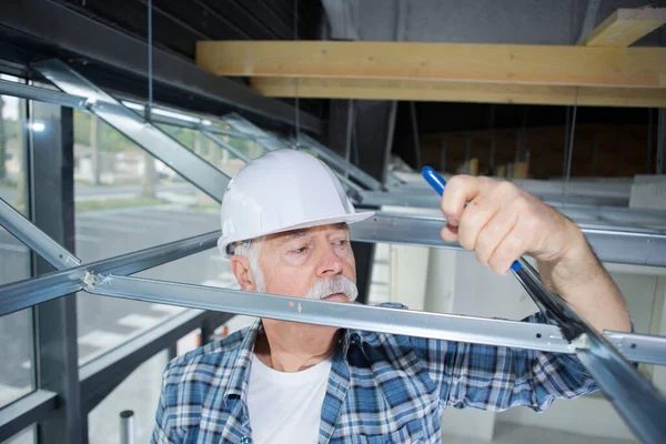 Senior Man Making Mount Electrical Wires Ceiling — 스톡 사진