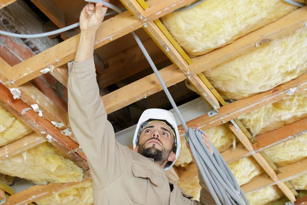 Young Builder Working Ceiling Electricity — Stockfoto