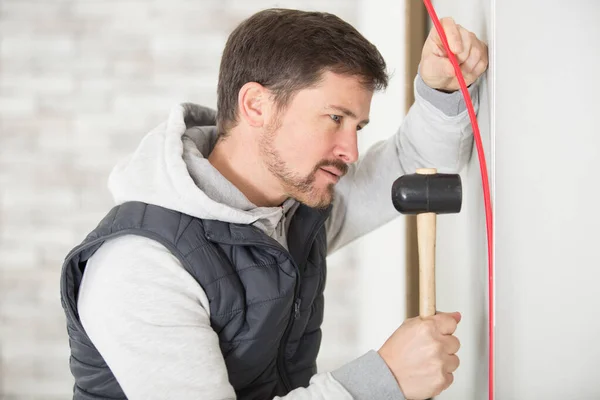 Man Holding Hammer Handle Plastic — Stock Photo, Image