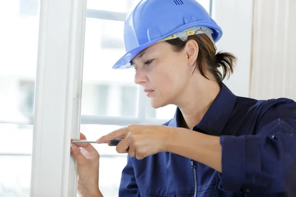 Woman Installing Window Handle Screwdriver Indoors — Stock Photo, Image