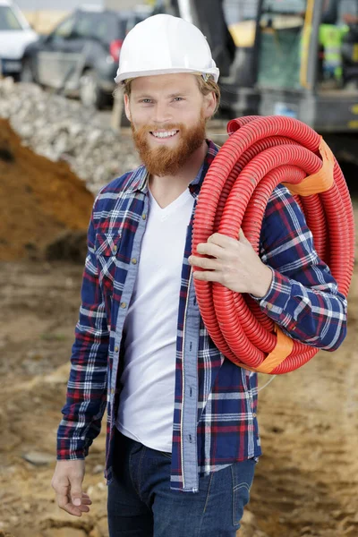 Boruları Olan Bir Inşaatçının Görüntüsü — Stok fotoğraf